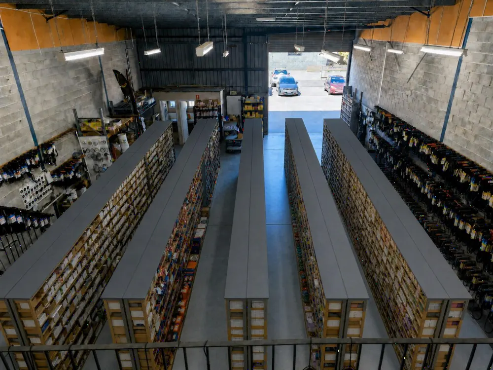 Warehouse aisles stocked with bearings and power transmission products